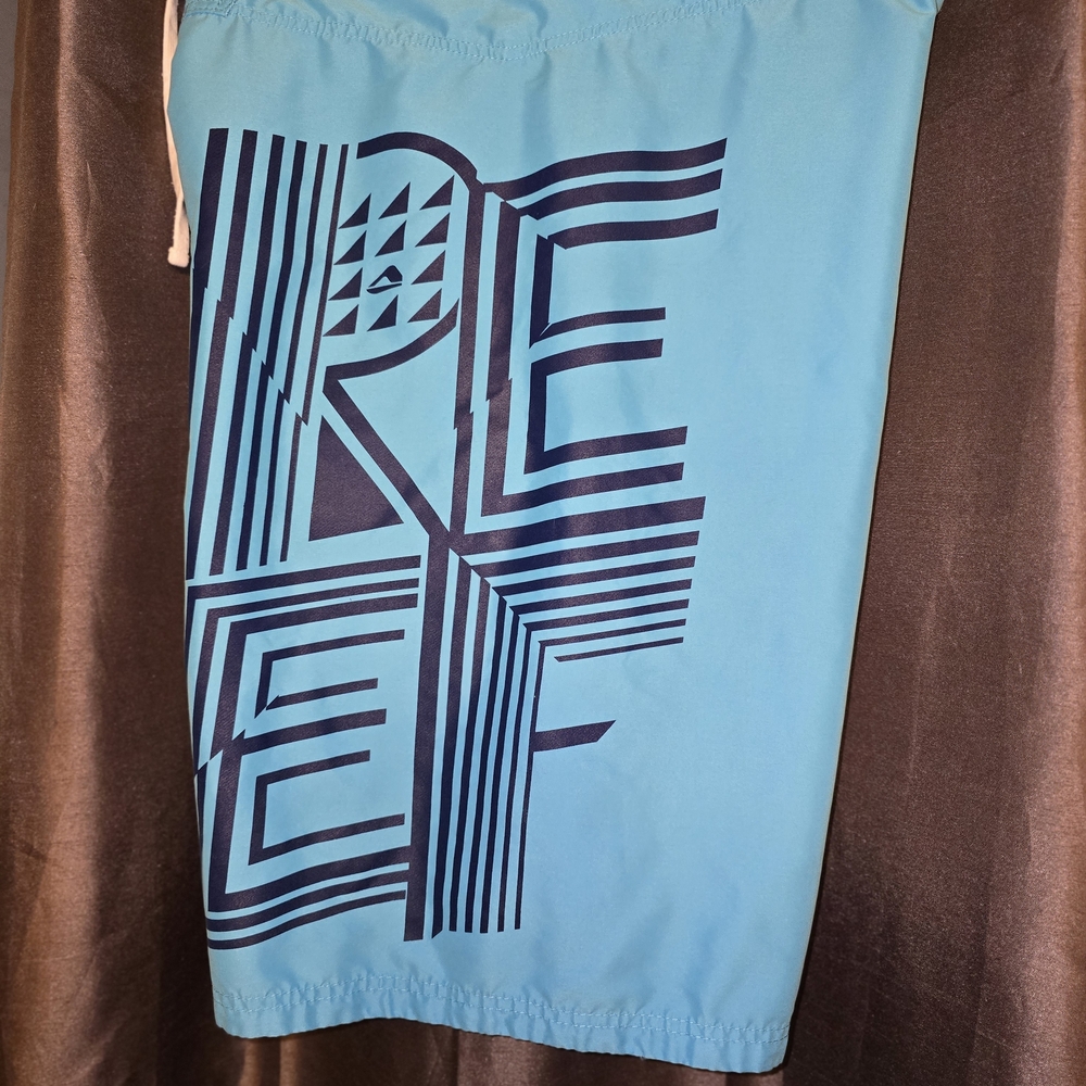 Reef Aqua and Navy Swim Board Shorts
